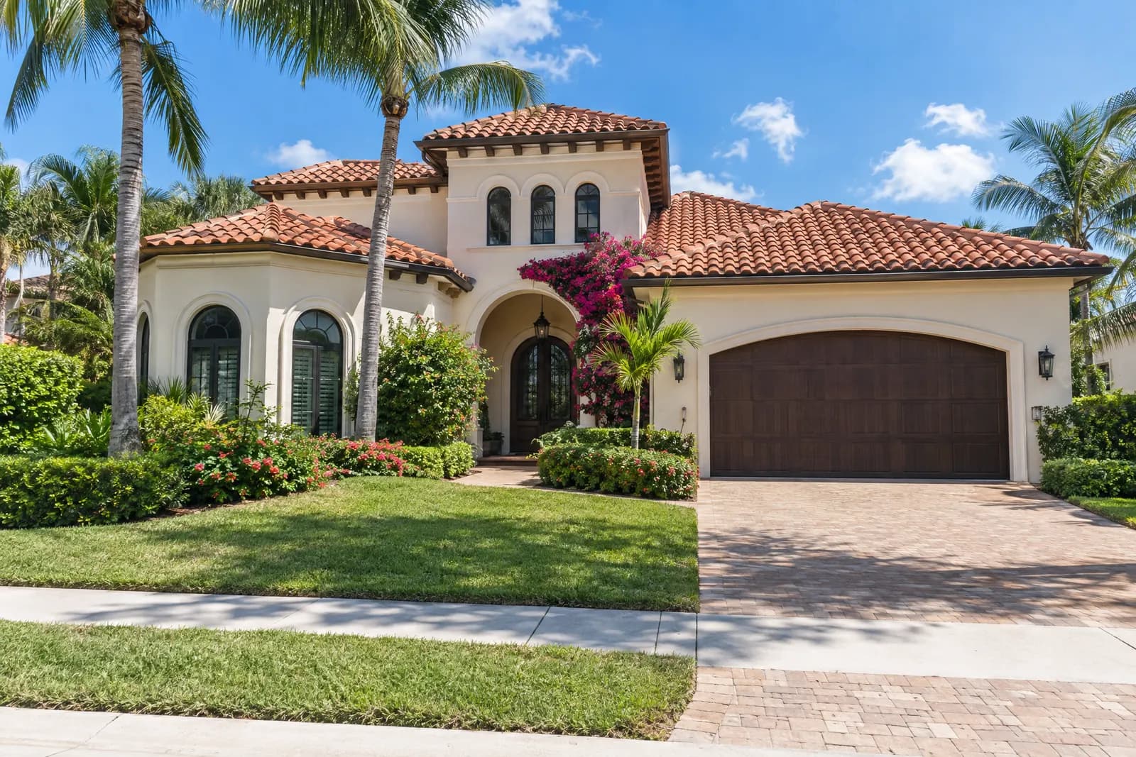 A Mediterranean-style house with a new terracotta concrete tile roof